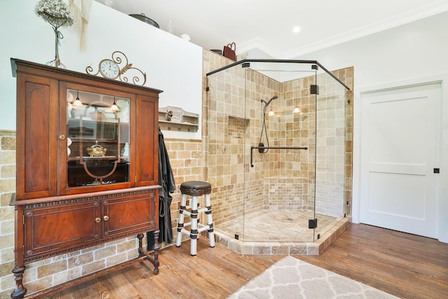 6624 Dillman Rd, West Palm Beach, FL 33413 - bathroom featuring a shower stall and wood finished floors