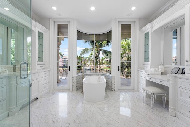 155 SE Spanish Trl, Boca Raton, FL 33432 - full bath featuring a soaking tub, marble tiled flooring, a water view, recessed lighting, and crown molding