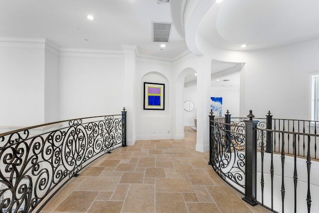 155 SE Spanish Trl, Boca Raton, FL 33432 - corridor with stone tile floors, ornamental molding, an upstairs landing, baseboards, and recessed lighting
