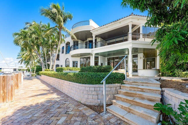 155 SE Spanish Trl, Boca Raton, FL 33432 - back of property featuring stucco siding