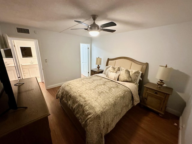 bedroom with baseboards, dark wood finished floors, and ceiling fan