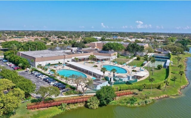 bird's eye view of a pool and a large body of water