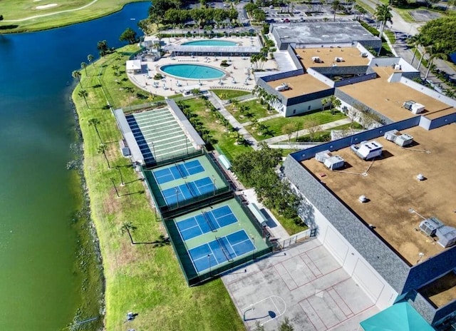 aerial view of a large body of water and a pool area