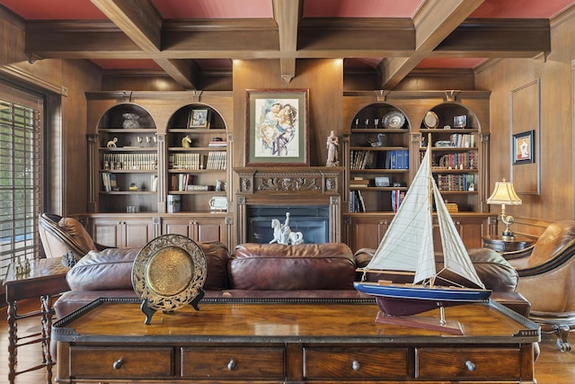 11 Wendy Ln, Stuart, FL 34994 - living area with built in shelves, wood walls, wood finished floors, coffered ceiling, and beam ceiling