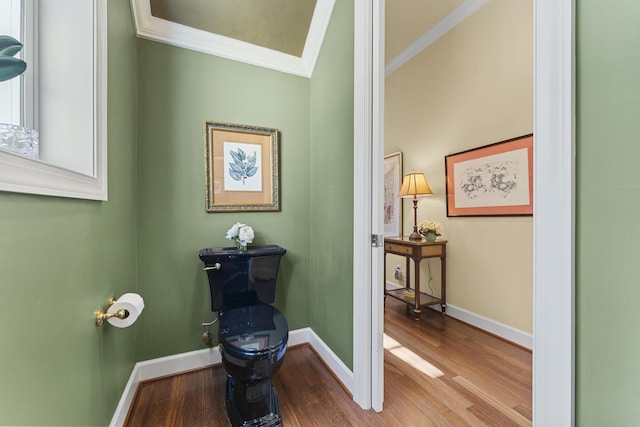 11 Wendy Ln, Stuart, FL 34994 - detailed view of crown molding, wood finished floors, and baseboards