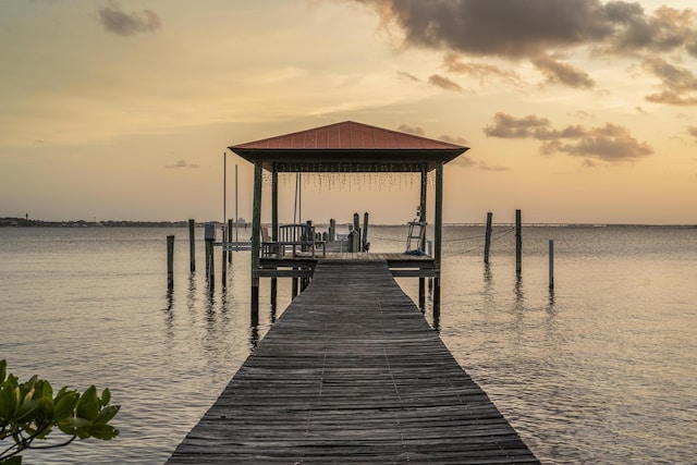 11 Wendy Ln, Stuart, FL 34994 - dock featuring boat lift and a water view