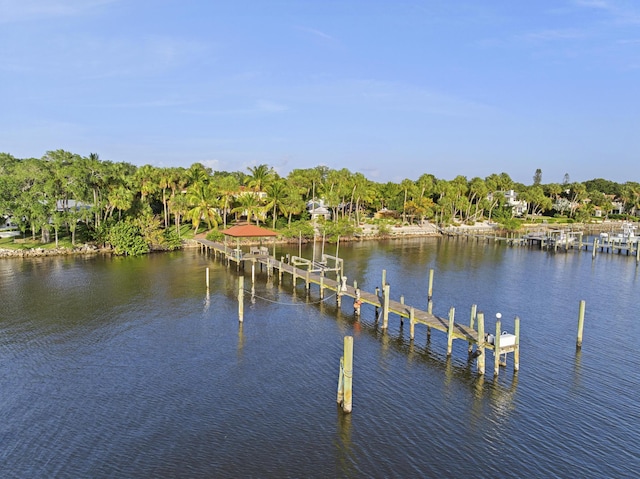 11 Wendy Ln, Stuart, FL 34994 - dock featuring a water view