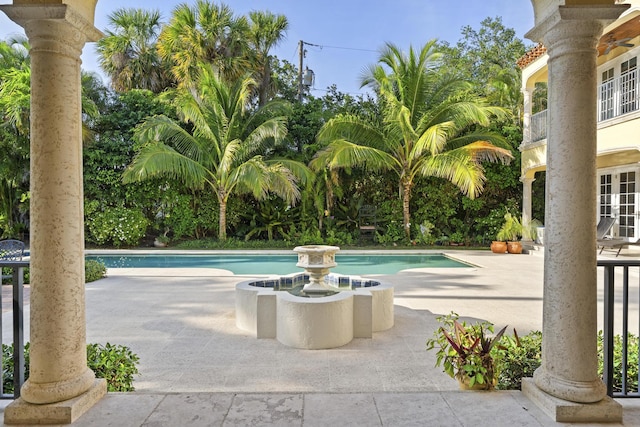 11 Wendy Ln, Stuart, FL 34994 - outdoor pool featuring a patio area and french doors