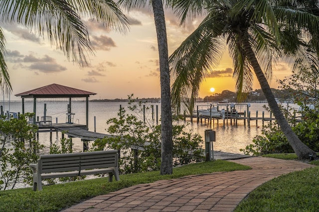 11 Wendy Ln, Stuart, FL 34994 - dock area featuring a water view and boat lift