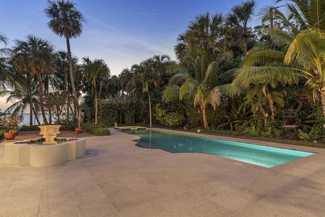 11 Wendy Ln, Stuart, FL 34994 - swimming pool featuring a patio