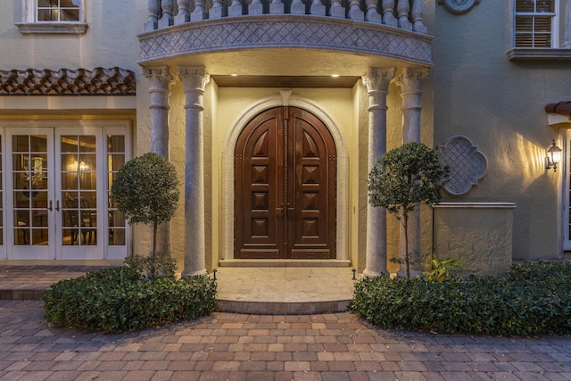 11 Wendy Ln, Stuart, FL 34994 - entrance to property with french doors and stucco siding