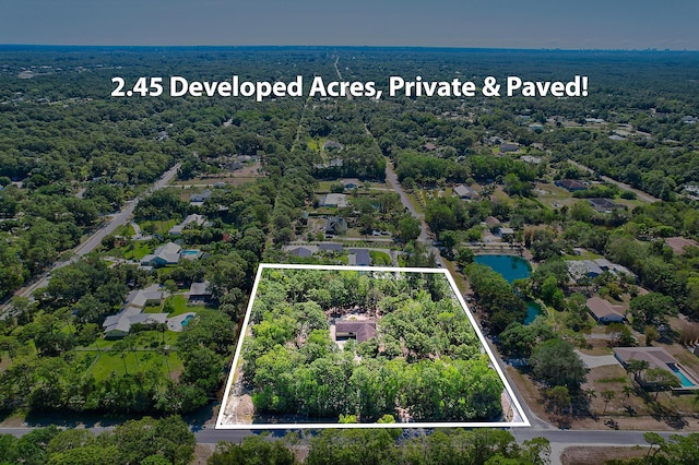 11473 154th Rd N, Jupiter, FL 33478 - view of property location with property parcel outlined and a heavily wooded area