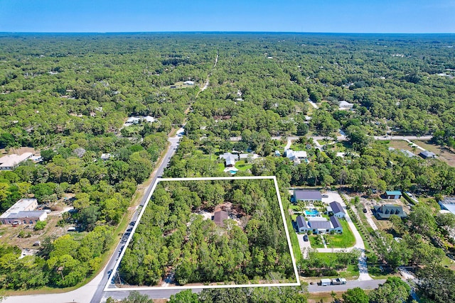 11473 154th Rd N, Jupiter, FL 33478 - aerial view of property and surrounding area featuring a forest and property parcel outlined