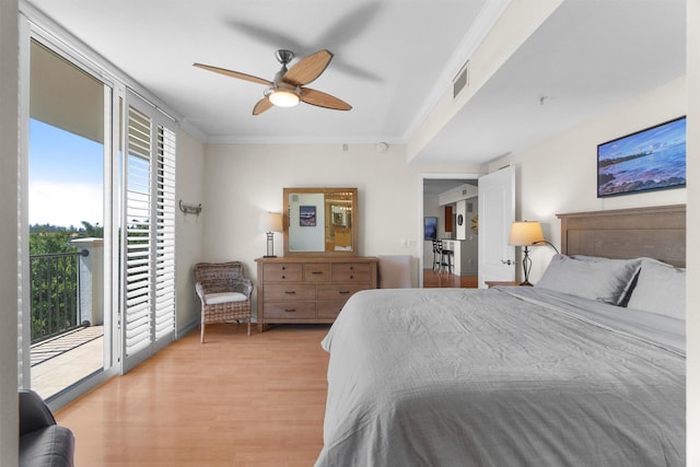 101 SE 20th Ave Unit 501, Deerfield Beach, FL 33441 - bedroom with access to outside, light wood-type flooring, ornamental molding, and a ceiling fan