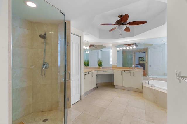 101 SE 20th Ave Unit 501, Deerfield Beach, FL 33441 - bathroom with a shower stall, a ceiling fan, a garden tub, vanity, and tile patterned flooring