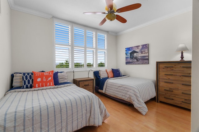 101 SE 20th Ave Unit 501, Deerfield Beach, FL 33441 - bedroom featuring wood finished floors, ornamental molding, and a ceiling fan