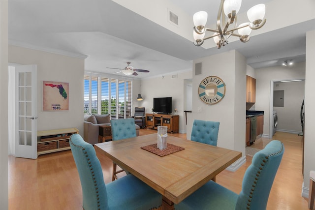101 SE 20th Ave Unit 501, Deerfield Beach, FL 33441 - dining room with light wood-style floors, electric panel, a chandelier, washer / dryer, and ceiling fan