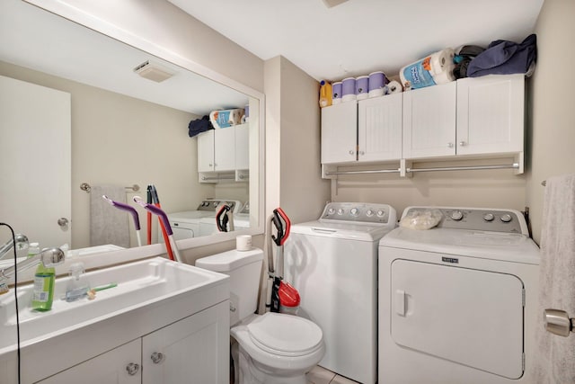2950 SW 22nd Cir Unit 4C, Delray Beach, FL 33445 - washroom featuring washing machine and clothes dryer