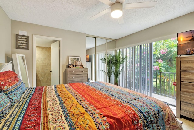 2950 SW 22nd Cir Unit 4C, Delray Beach, FL 33445 - bedroom featuring a textured ceiling, access to exterior, a ceiling fan, and a closet