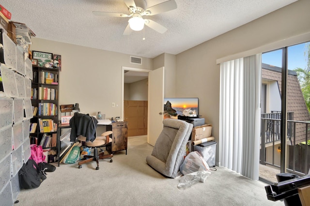 2950 SW 22nd Cir Unit 4C, Delray Beach, FL 33445 - carpeted home office with a ceiling fan and a textured ceiling