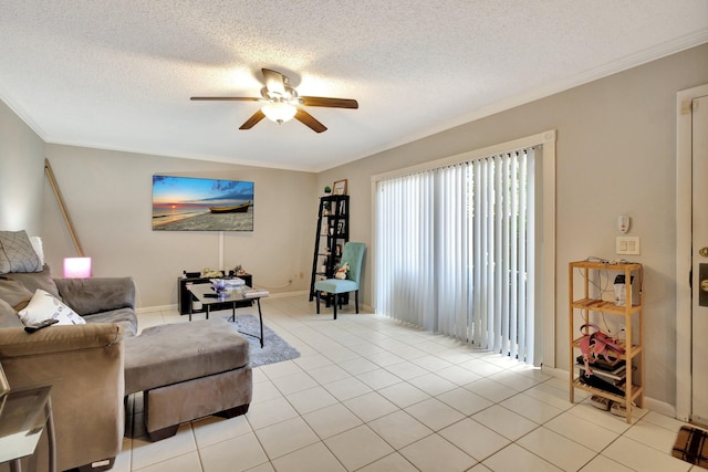 2950 SW 22nd Cir Unit 4C, Delray Beach, FL 33445 - living area featuring ceiling fan, ornamental molding, a textured ceiling, light tile patterned flooring, and baseboards
