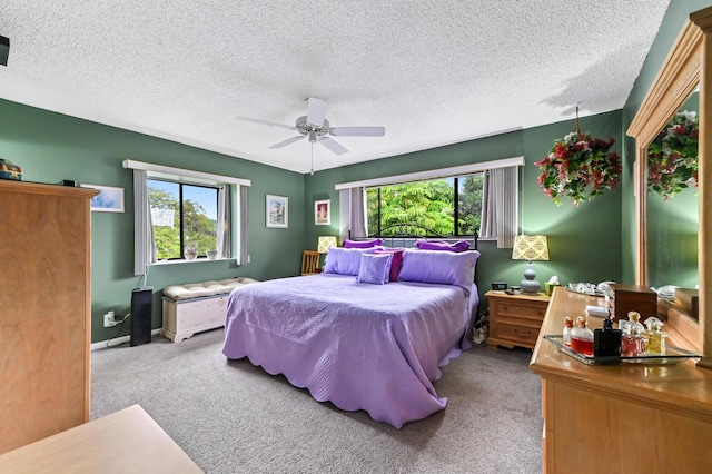 3001 SE Aster Ln Unit 908, Stuart, FL 34994 - carpeted bedroom with ceiling fan, a textured ceiling, and baseboards