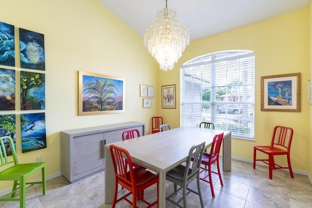 2904 SW Sutton Pl, Palm City, FL 34990 - dining area with a chandelier, baseboards, vaulted ceiling, and light tile patterned floors