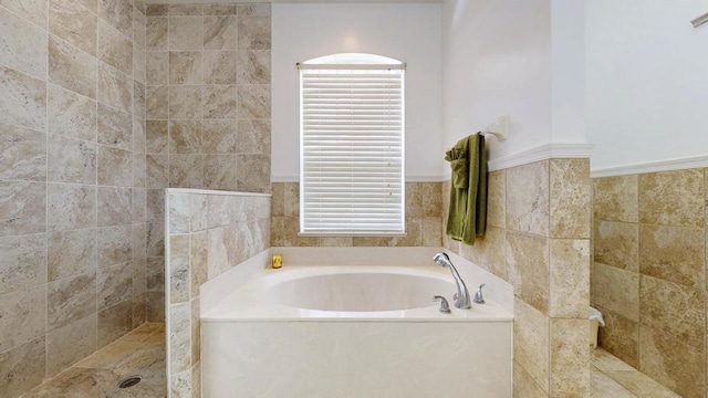 2904 SW Sutton Pl, Palm City, FL 34990 - full bath featuring a garden tub, walk in shower, and tile walls
