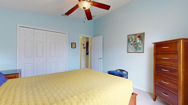 2904 SW Sutton Pl, Palm City, FL 34990 - bedroom featuring lofted ceiling, a closet, light colored carpet, and ceiling fan
