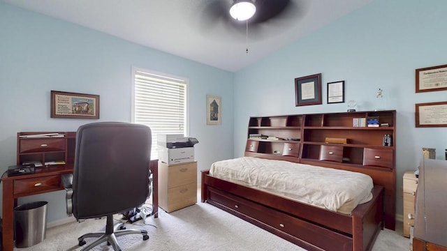 2904 SW Sutton Pl, Palm City, FL 34990 - bedroom featuring light colored carpet, an office area, vaulted ceiling, and a ceiling fan