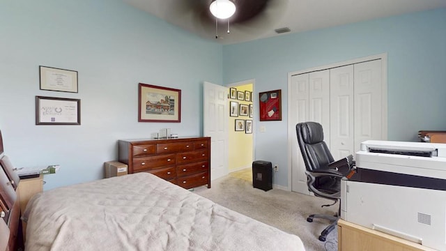 2904 SW Sutton Pl, Palm City, FL 34990 - bedroom featuring light carpet, a closet, a desk, a ceiling fan, and baseboards