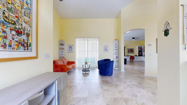 2904 SW Sutton Pl, Palm City, FL 34990 - corridor with arched walkways and a high ceiling