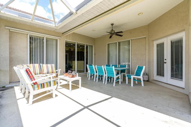 2904 SW Sutton Pl, Palm City, FL 34990 - view of patio with ceiling fan, french doors, and outdoor dining area