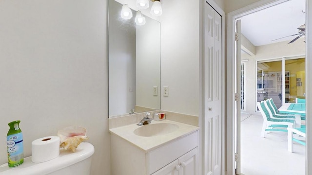 2904 SW Sutton Pl, Palm City, FL 34990 - half bath with toilet, vanity, and ceiling fan