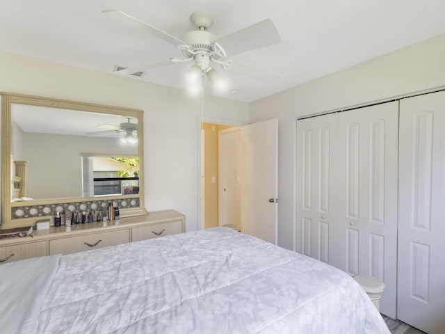 bedroom with a closet and a ceiling fan