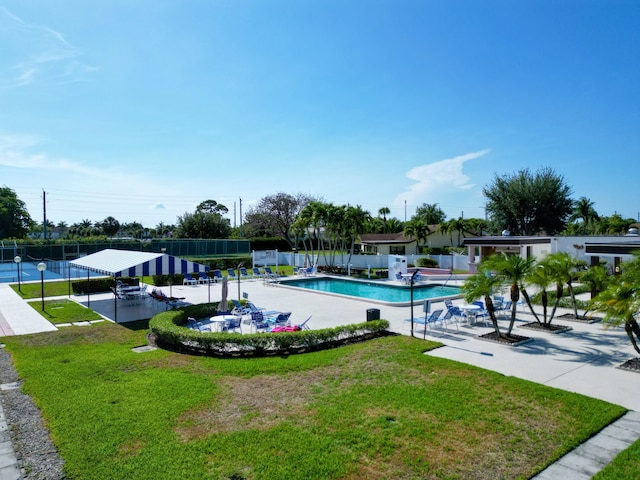 community pool with a patio