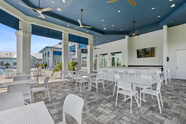 view of patio featuring a ceiling fan