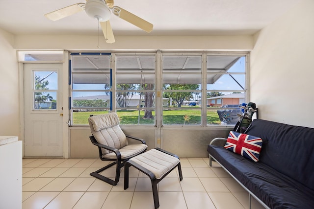 sunroom featuring plenty of natural light and ceiling fan