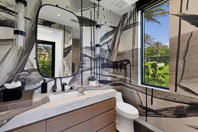 1940 S Ocean Blvd, Manalapan, FL 33462 - bathroom featuring healthy amount of natural light, vanity, and toilet