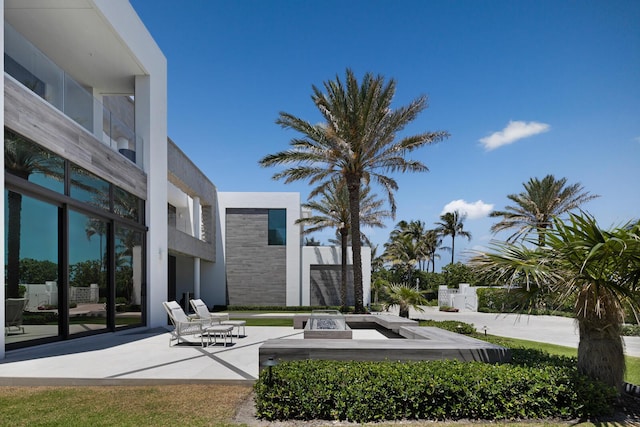 1940 S Ocean Blvd, Manalapan, FL 33462 - view of yard featuring a patio area