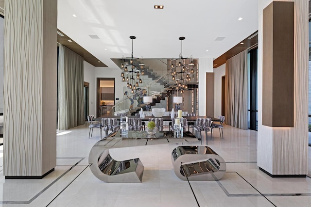 living area featuring tile patterned flooring, a chandelier, and recessed lighting