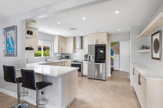 18320 181st Cir S, Boca Raton, FL 33498 - kitchen featuring appliances with stainless steel finishes, open shelves, wall chimney range hood, a sink, and a peninsula