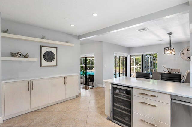 18320 181st Cir S, Boca Raton, FL 33498 - kitchen with beverage cooler, light countertops, recessed lighting, hanging light fixtures, and light tile patterned floors