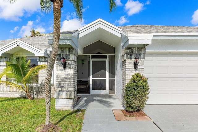 18320 181st Cir S, Boca Raton, FL 33498 - entrance to property featuring an attached garage and a shingled roof