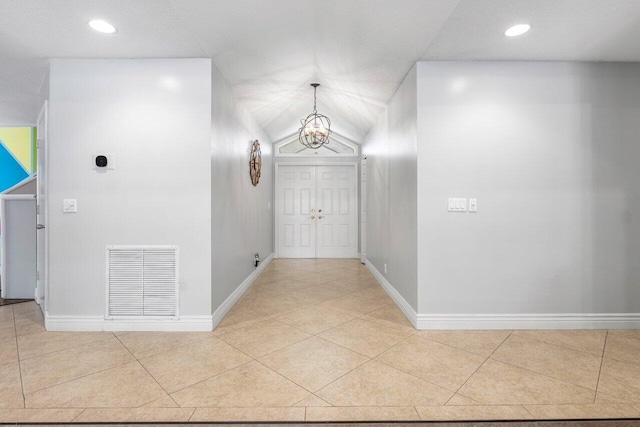 18320 181st Cir S, Boca Raton, FL 33498 - hallway with a chandelier, baseboards, tile patterned floors, lofted ceiling, and recessed lighting