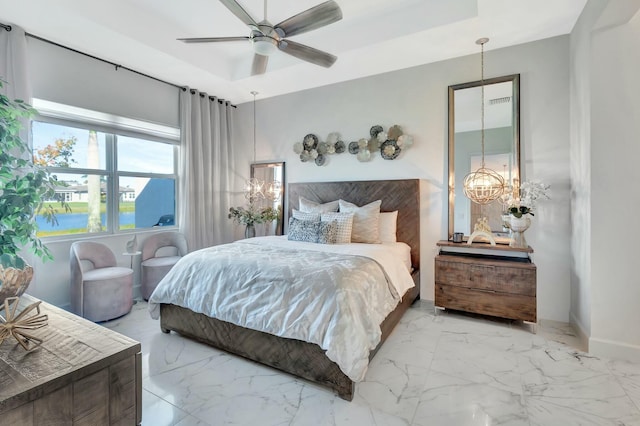 bedroom featuring marble look tiles, a chandelier, baseboards, and a tray ceiling