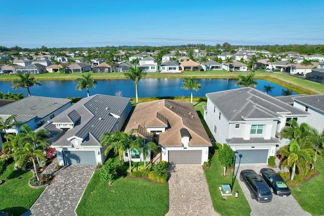 aerial perspective of suburban area featuring a large body of water