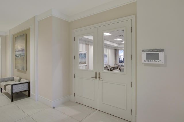 13339 SW River Rock Rd, Port Saint Lucie, FL 34987 - foyer entrance featuring light tile patterned floors and baseboards
