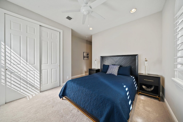 carpeted bedroom featuring baseboards, recessed lighting, a ceiling fan, and a closet