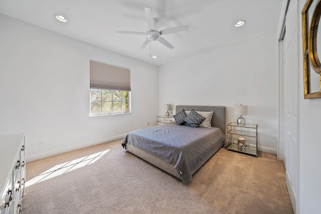 bedroom with carpet flooring, baseboards, recessed lighting, and a ceiling fan